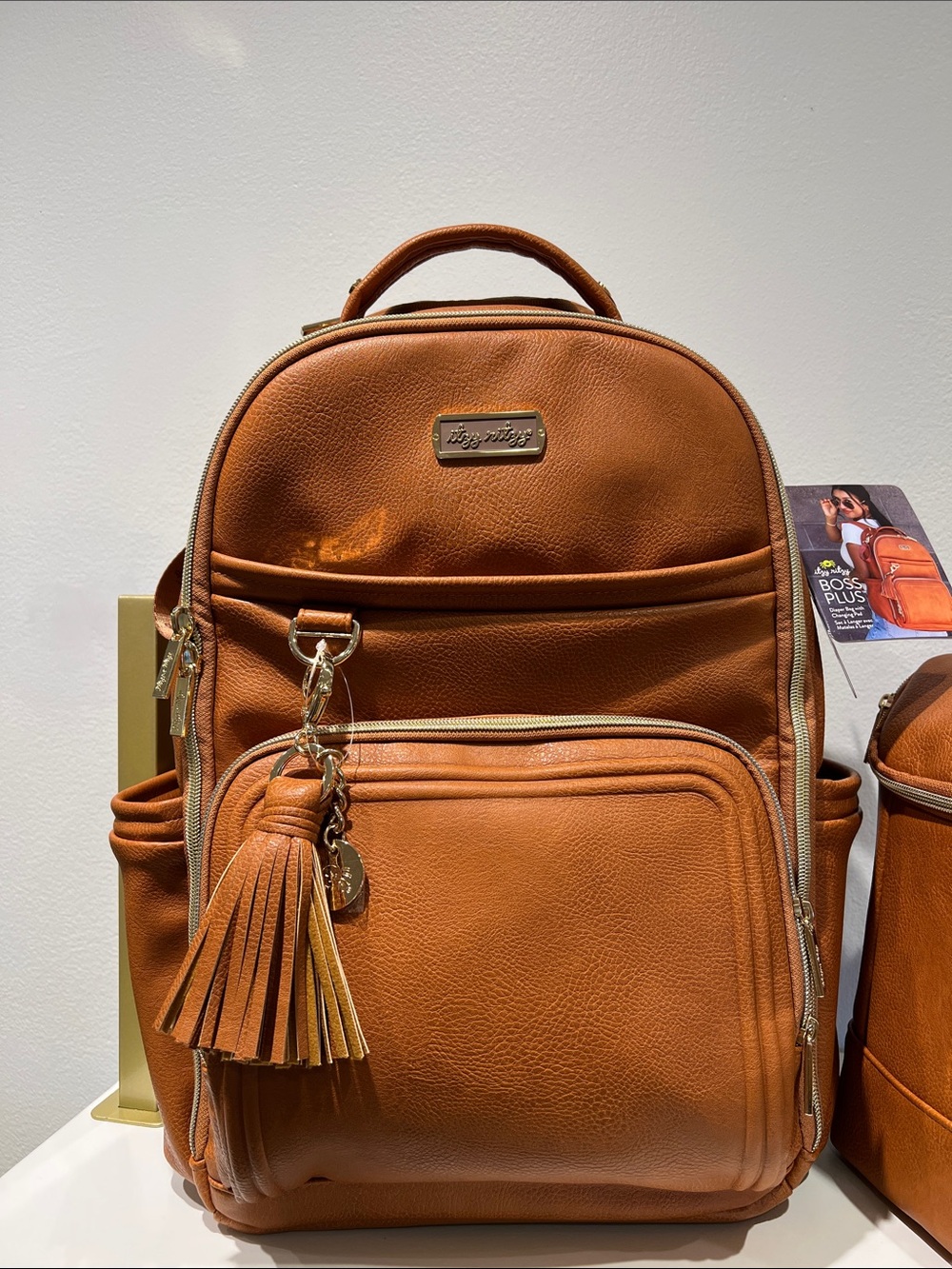 ⭐️Itzy Ritzy ⭐️ Brand New!! Cognac Boss Plus Diaper Bag with changing pad